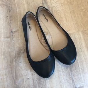 Black leather flats